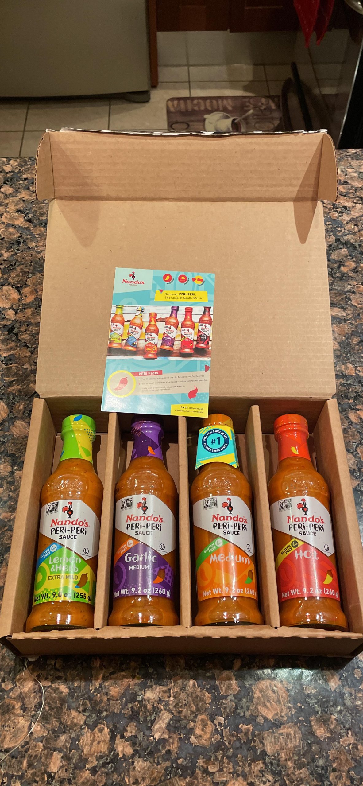 Nando's PERi-PERi Hot Sauce Variety Gift Pack - Medium, Hot, Garlic, Lemon & Herb Piri Piri Sauces | Flavorful Hot Sauce Gift Set Box | Great as Wing Sauces! Gluten Free - 9.1 oz (4 Pack) customer photo 2