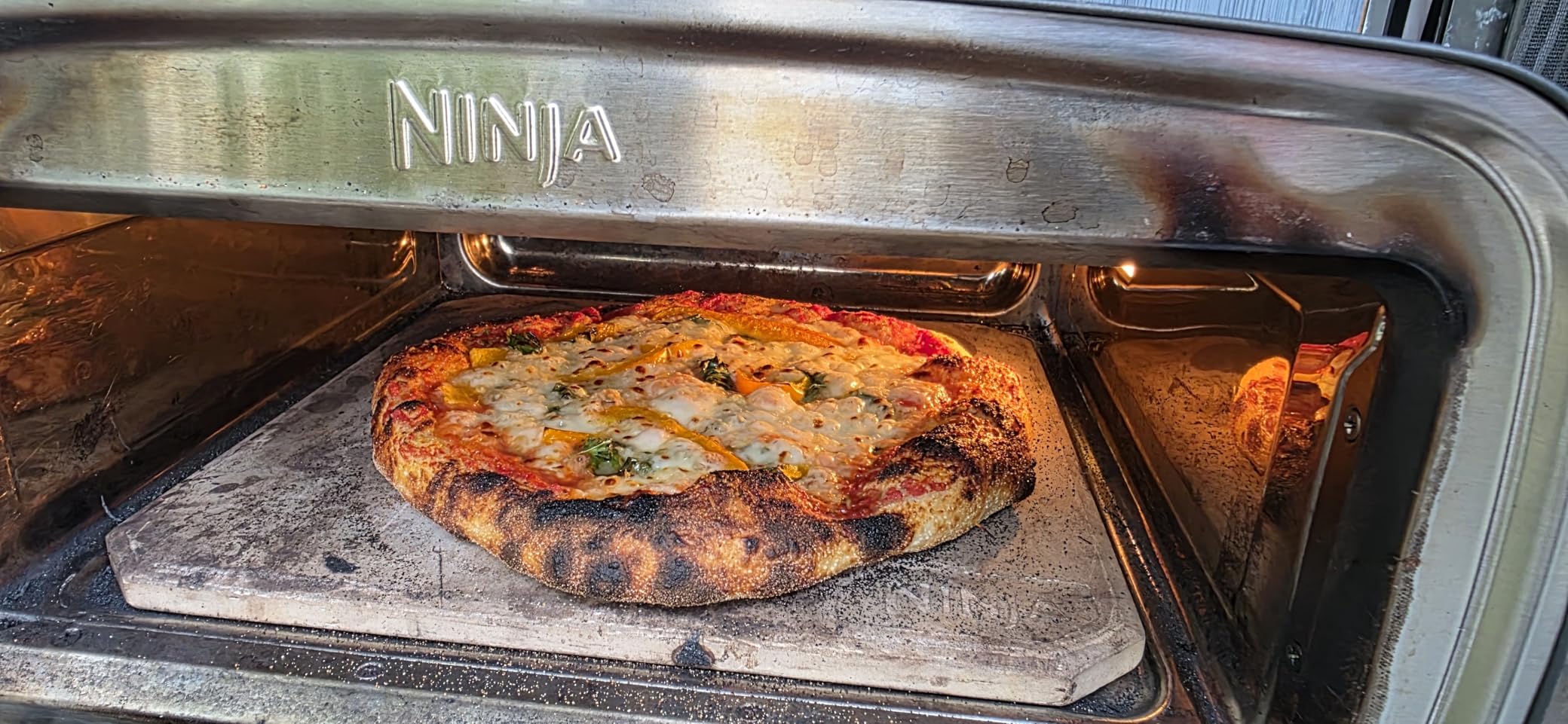 Ninja Artisan Electric Outdoor Pizza Oven with Stone | 12-inch Pizza in 3-minutes | 700F Max Temp | 5-in-1 Functionality - Pizza, Bake, Broil, Proof & Warm | Gray | MO201 customer photo 2