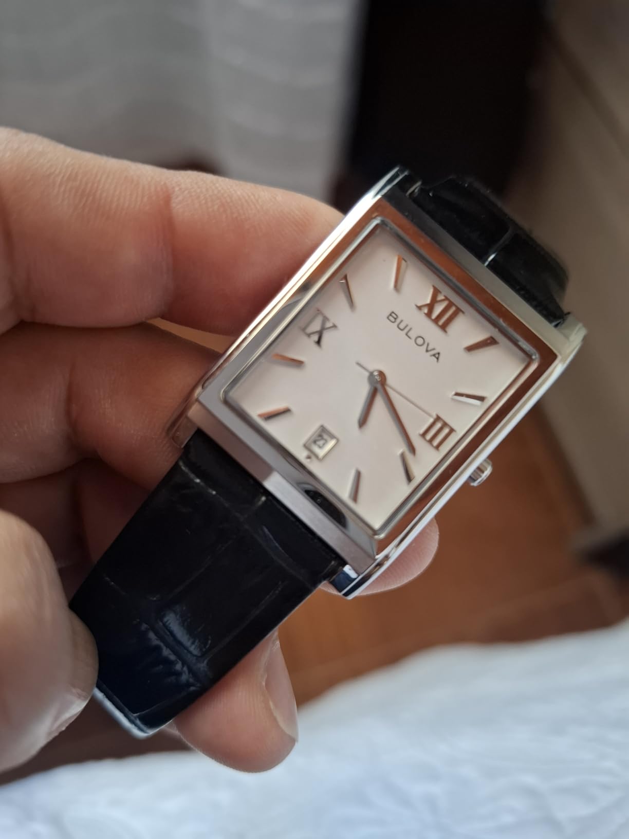 Bulova Men's Stainless Steel 3-Hand Calendar Date Quartz Watch with Black Leather Strap, Rectangle Dial Style: 96B107 customer photo 1