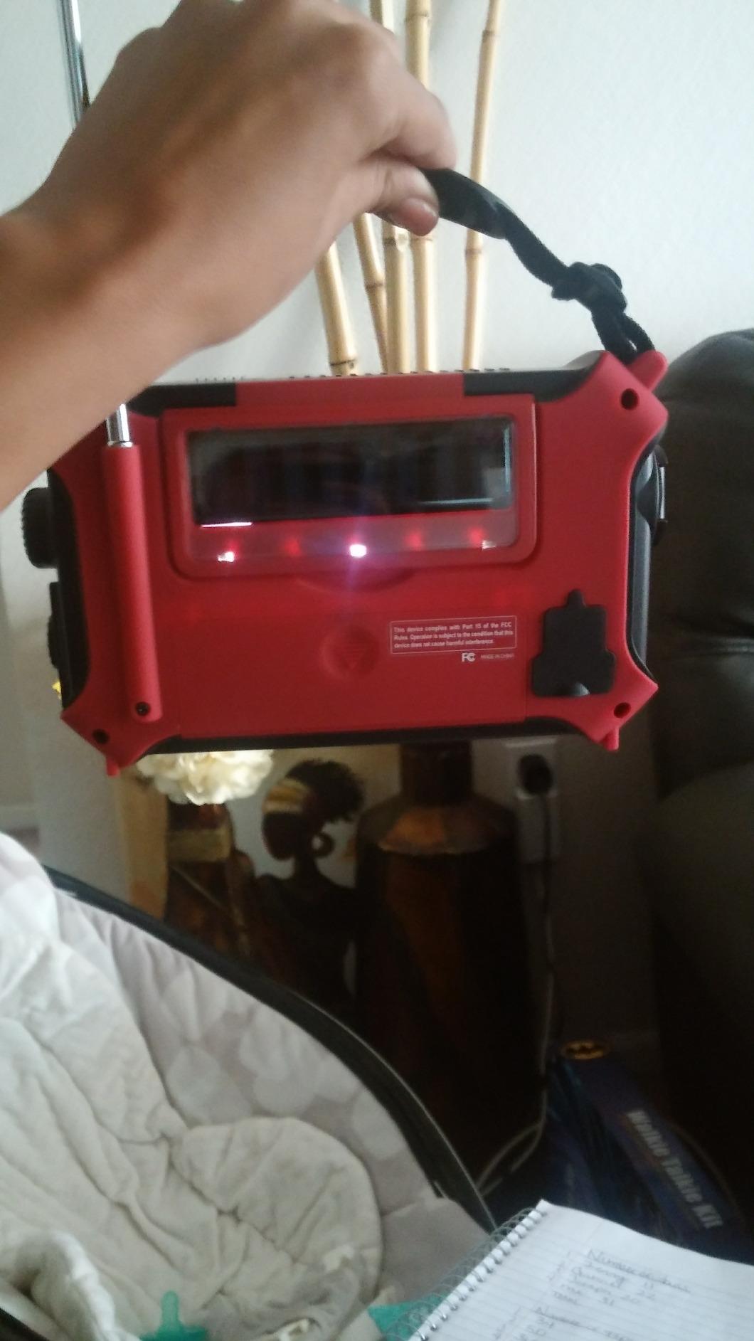 Kaito KA500IP-RED Voyager Solar/Dynamo AM/FM/SW NOAA Weather Radio with Alert and Cell Phone Charger, Red customer photo 1