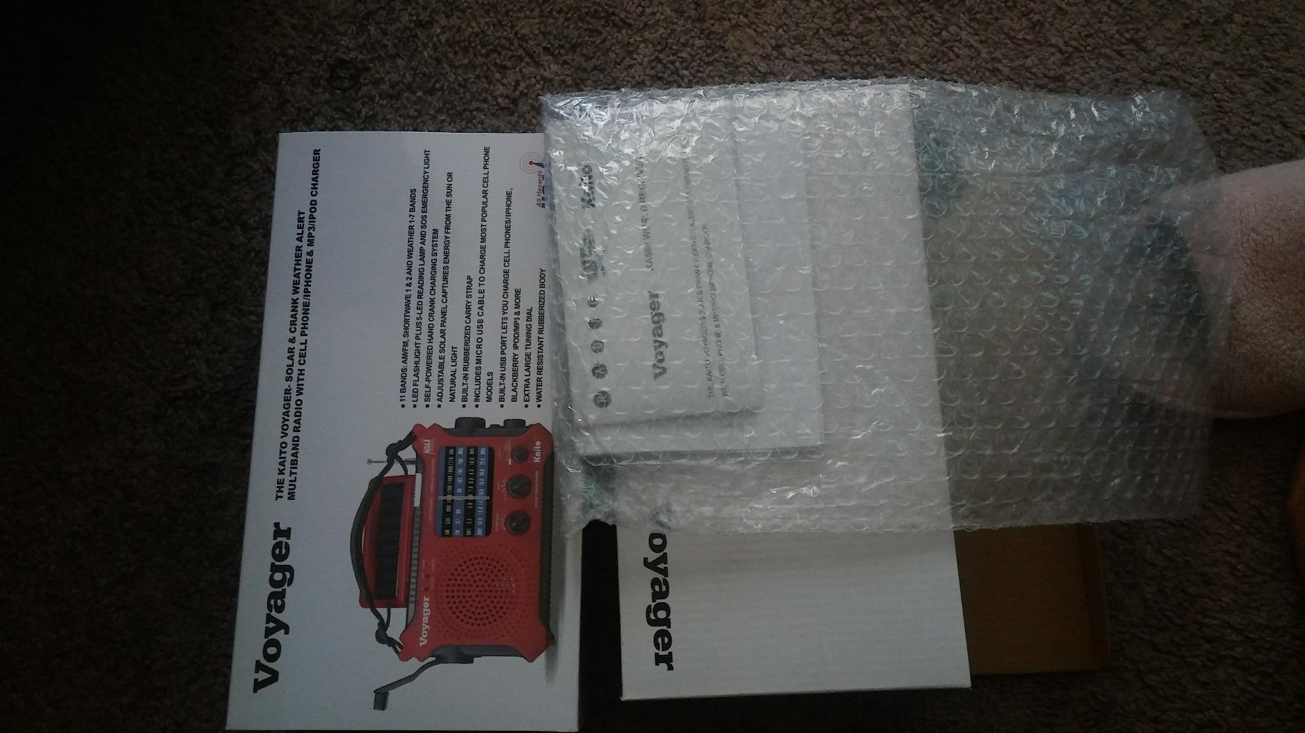 Kaito KA500IP-RED Voyager Solar/Dynamo AM/FM/SW NOAA Weather Radio with Alert and Cell Phone Charger, Red customer photo 2