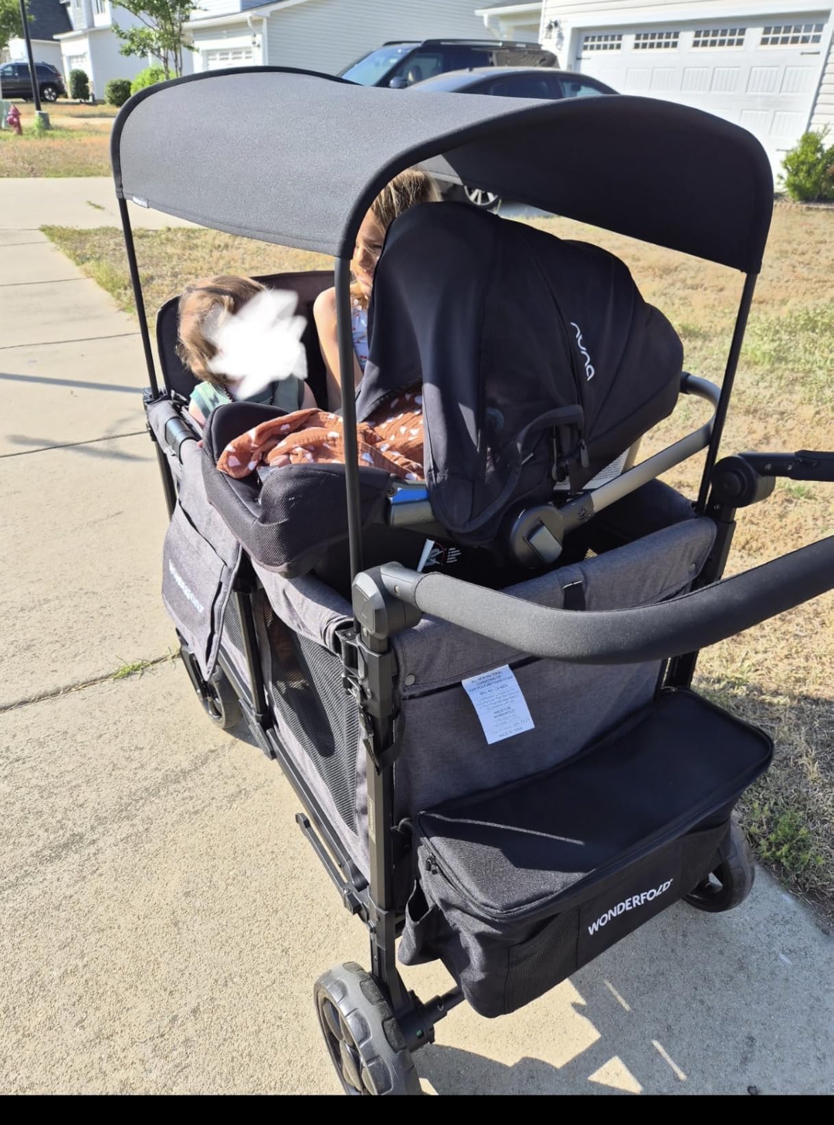 WonderFold W4 Original Stroller Wagon - Foldable Wagon with 5 Point Harness - Adjustable Canopy & Deep Carriage - All-Terrain Wheels - for Babies, Toddlers & Kids - 4 Seater - Black customer photo 2