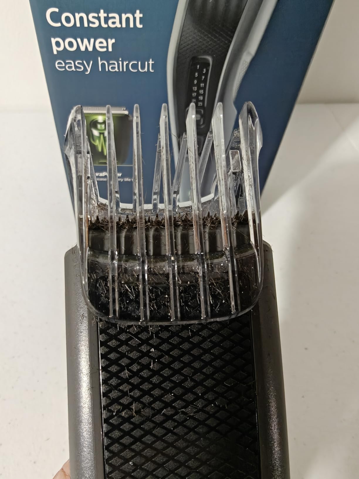 Philips Hair Clipper 7000 Series, Hair and Beard Trimmer, Precision Dial, PowerAdapt Sensor, Trim-and-Flow, DualCut, DuraPower, 28 Length Settings, 90 Min. Runtime, Model HC7650/40 customer photo 1