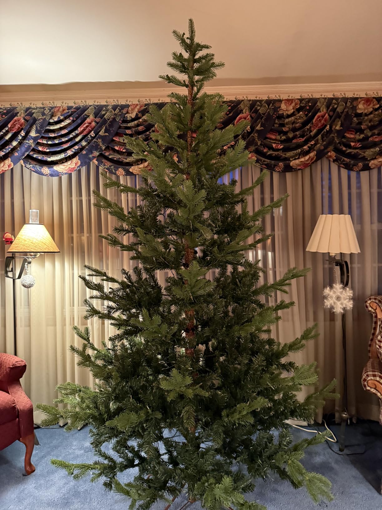 National Tree Company 'Feel Real' Pre-lit Artificial Christmas Tree | Includes Pre-strung White Lights and Stand | Norwegian Spruce - 7.5 ft customer photo 1