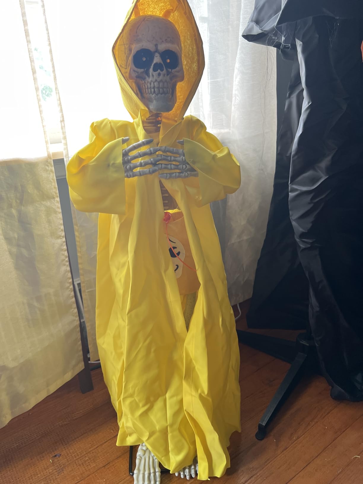 Halloween Animatronic Tombstone with Moving Skeleton - Sensor Activated Animated Scary Prop with Creepy Sound & Light-Up Eyes for Haunted House, Yard,Halloween Party Decor customer photo 1