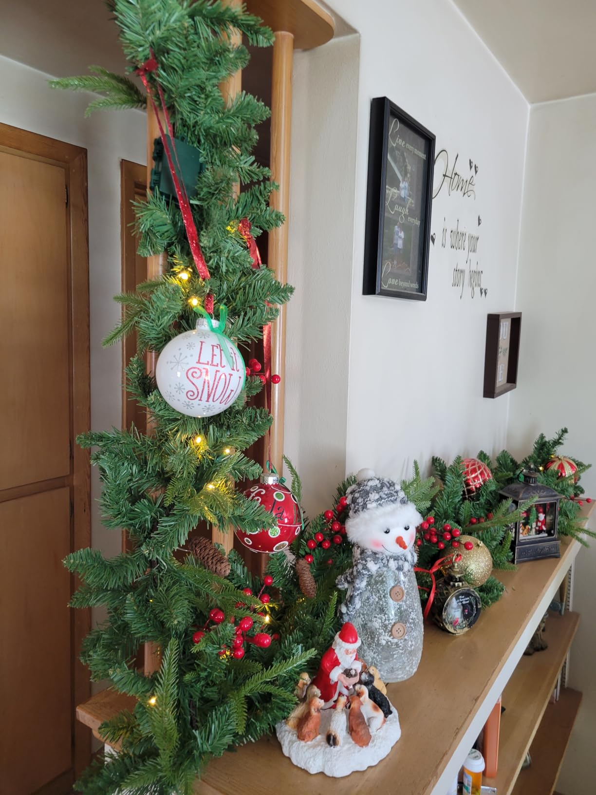 9 ft Pre-Lit Christmas Garland with 30 LED Lights, Pine Cones and Berries | Battery-operated garland with 240 tips, pine cones and red berries for mantels and stairs; 3 AA batteries not included customer photo 1