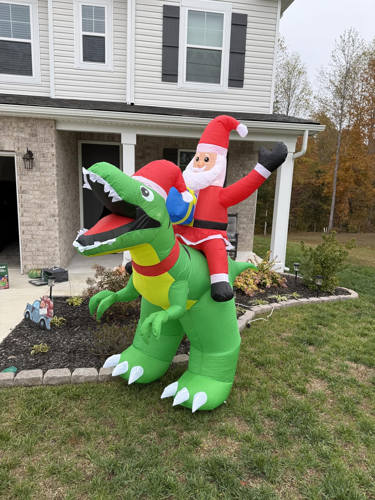 9x7FT Christmas Inflatables Santa Ride on Dinosaur with LED Outdoor Christmas Dinosaur Inflatable Blow Up Yard Decorations with Sandbags Stakes Strings for Garden Decor customer photo 1