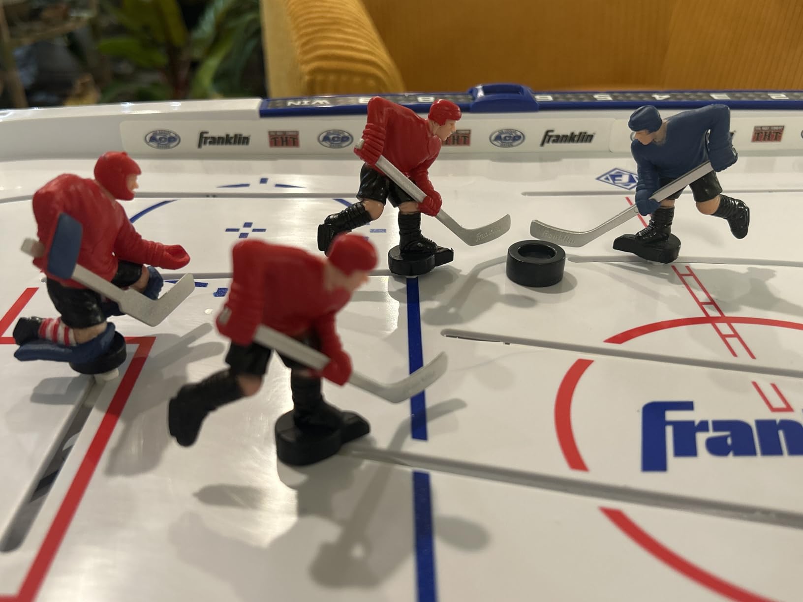 Franklin Sports Tabletop Rod Hockey Game - Gameroom Ice Hockey Table Game for Kids + Adults - Arcade Style Board + Mini Pucks Included customer photo 1