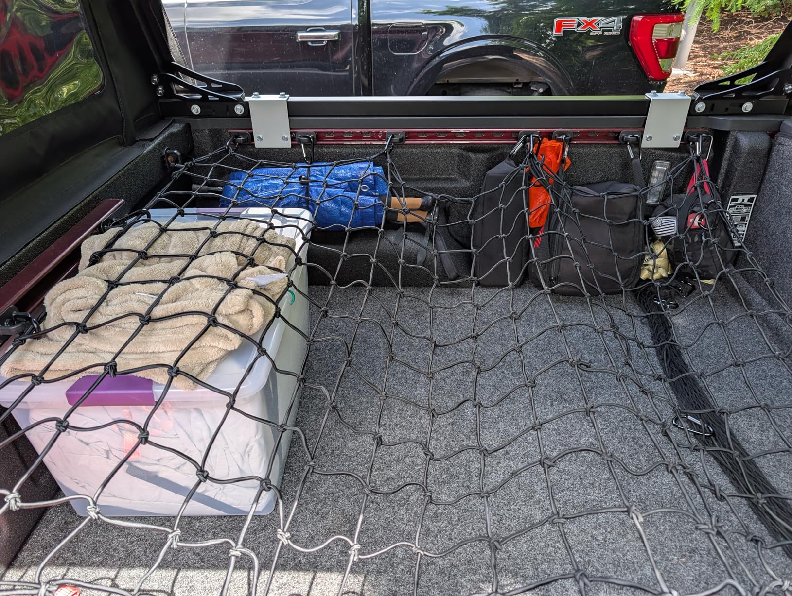 Truck Bed Cargo Net - 4 x 6 Foot, Heavy-Duty Elastic Mesh with 12 Black Clips and Storage Bag for Pickup for Cargo Netting, Securing Loads in Trailers, SUVs & Roof Racks customer photo 1