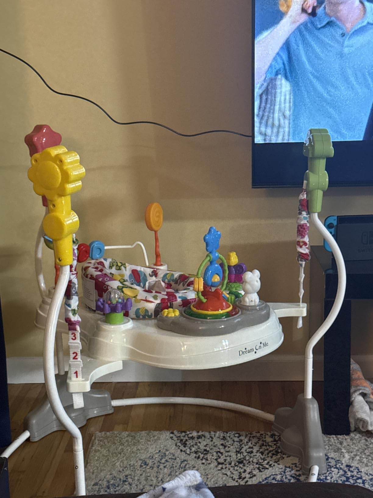 Dream On Me 2-in-1 Baby Activity Center & Bouncer Jumper, 360° Rotating Seat, 3-Height Adjustable, 12 Melodies with Lights & Interactive Toys, Promotes Early Development - Star Print customer photo 2
