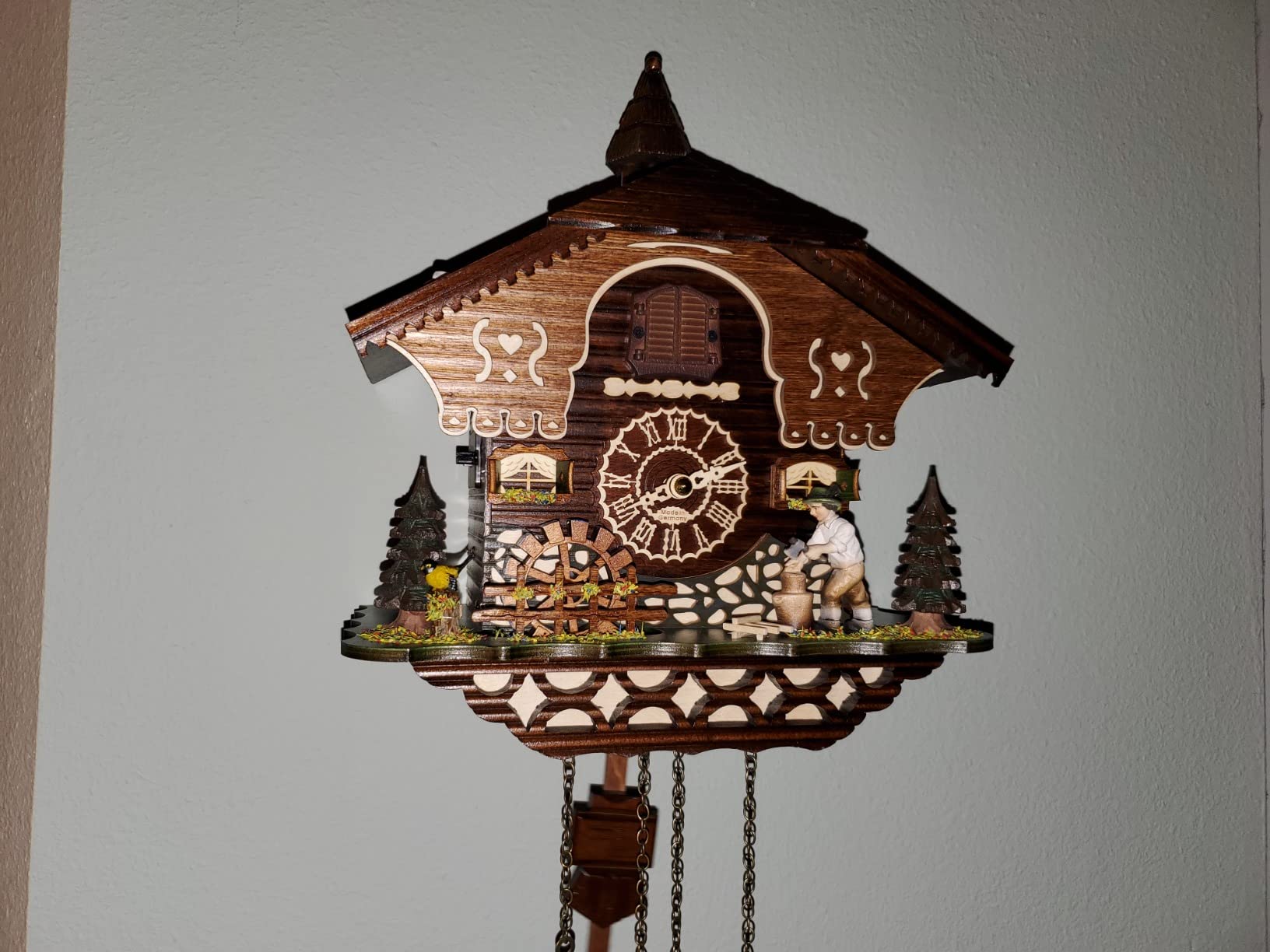 Trenkle Quartz Cuckoo Clock Black Forest House with Moving Wood Chopper and Mill Wheel, with Music TU 4217 QM customer photo 1