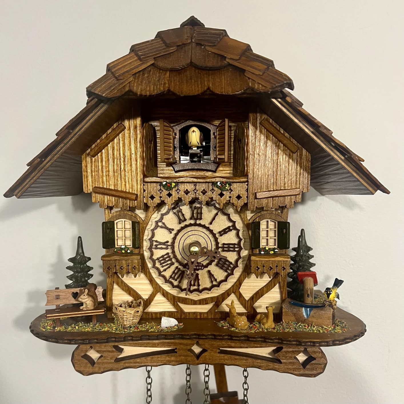 Cuckoo Palace German Cuckoo Clock – Black Forest Hillside Chalet with Animal Figures – Quartz Movement with Music – Night Silence Sensor – 10.6 Inch Wall Clock customer photo 1