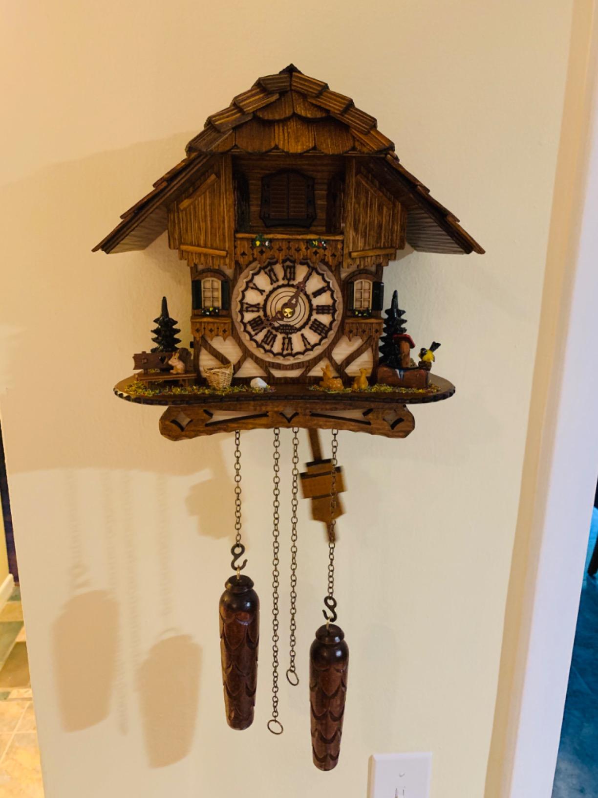 Cuckoo Palace German Cuckoo Clock – Black Forest Hillside Chalet with Animal Figures – Quartz Movement with Music – Night Silence Sensor – 10.6 Inch Wall Clock customer photo 2