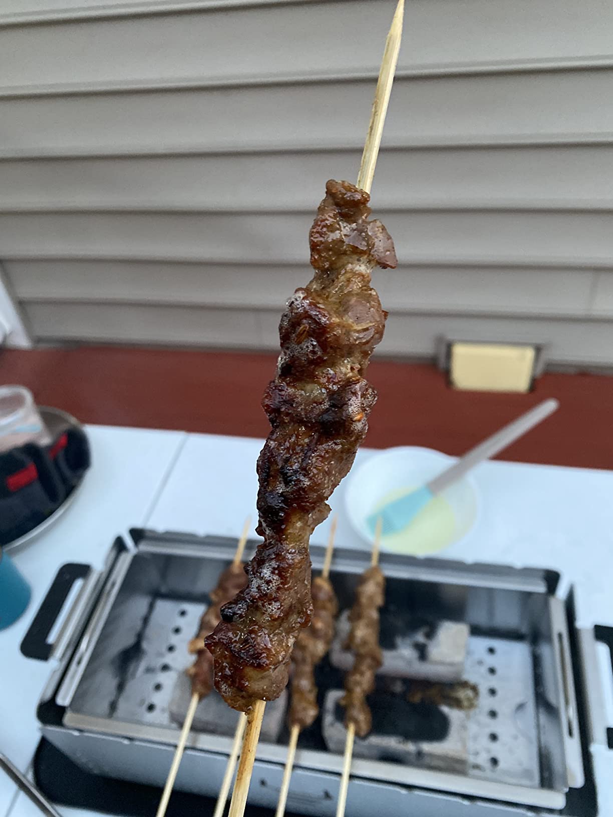 Portable Tabletop Charcoal Grill, YAK Grills Hibachi, 100% Stainless Steel, Grill at 750ºF, Patio, Balcony. 15”x7” Grilling Area. Includes Grate Handle & Carrying Case. customer photo 1