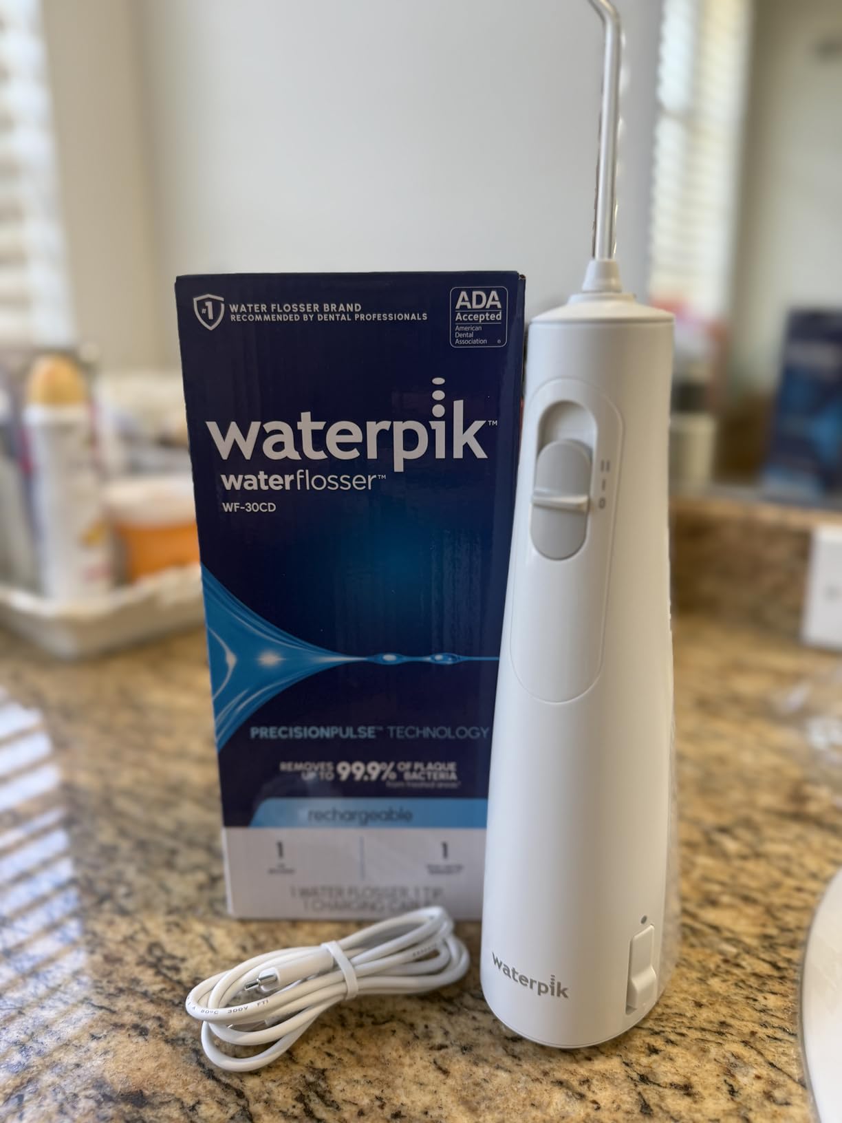 Waterpik Cordless 1100 Rechargeable Portable Water Flosser for Teeth Cleaning and Flossing, Travel, Braces Care, Healthier Gums, Waterproof for Shower, ADA Accepted, WF-30CD White, Packaging May Vary customer photo 2